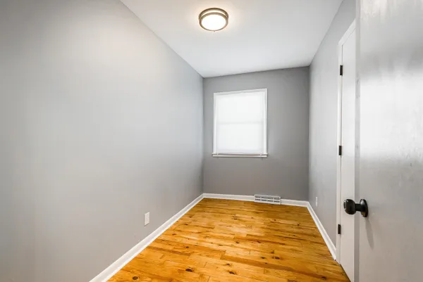 a view of a room with a window