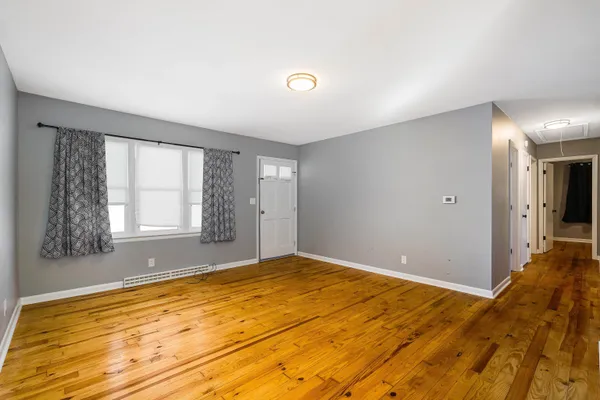 a view of an empty room and window