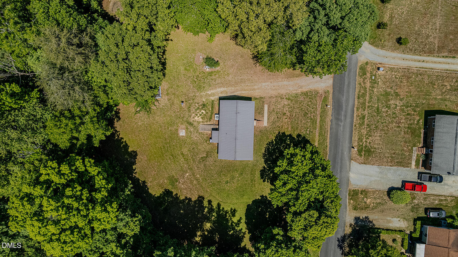 1302 Blacksmith Road Efland, NC 27243 - Photo 42 of 46 an aerial view of a house with a yard