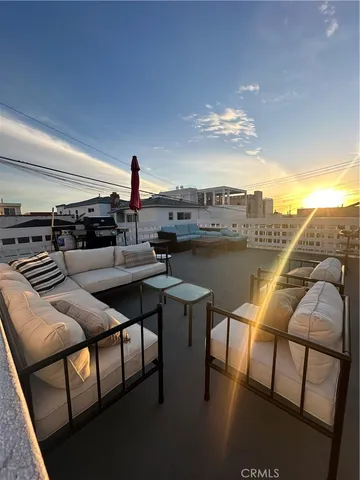 a kitchen with a table chairs and a stove