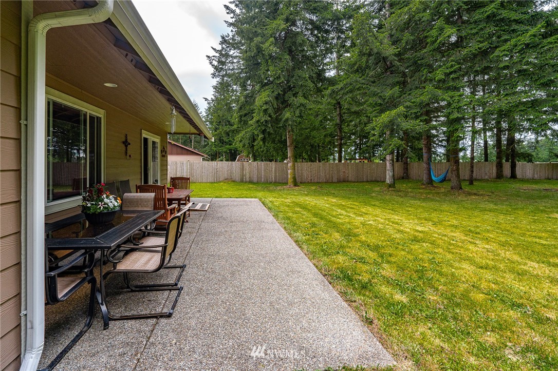 5120 180th Trail Southwest Rochester, WA 98579 - Photo 8 of 32 a view of yard with swimming pool and sitting area