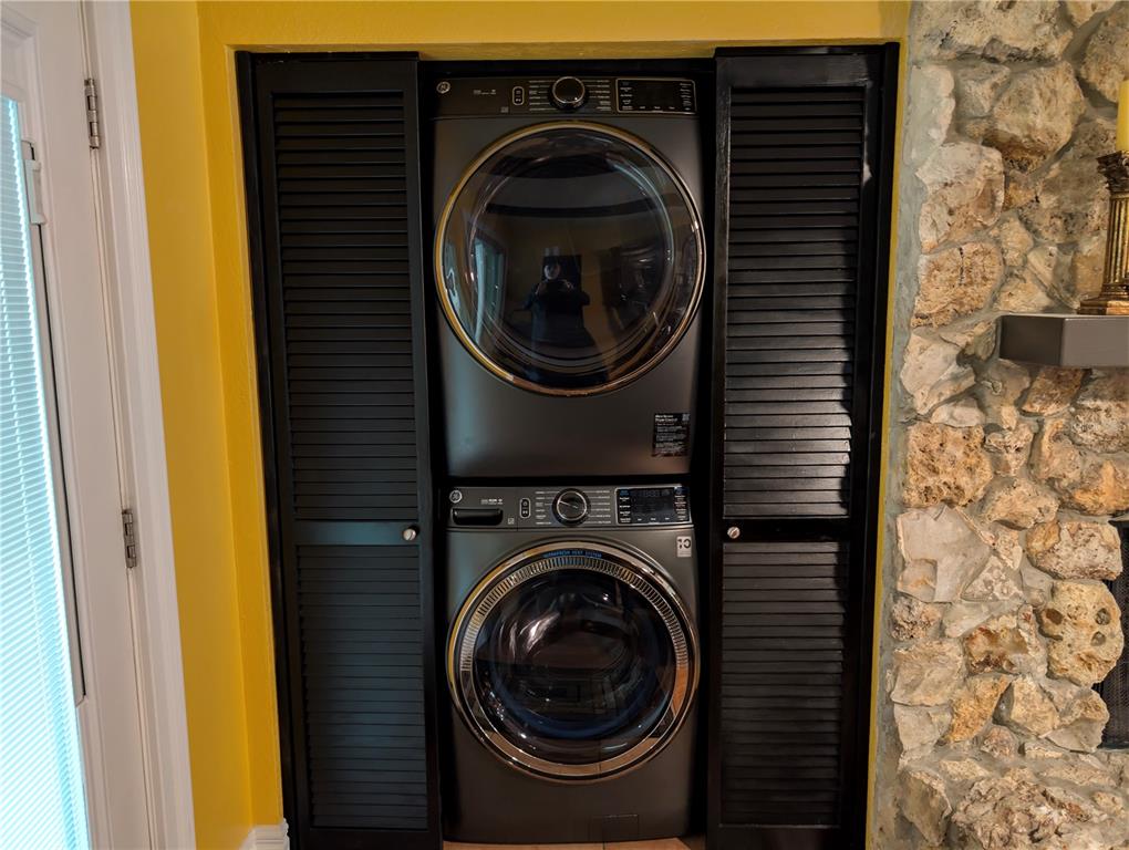 9897 Southwest 88th Court Road, Unit P Ocala, FL 34481 - Photo 13 of 35 a utility room with dryer and washer