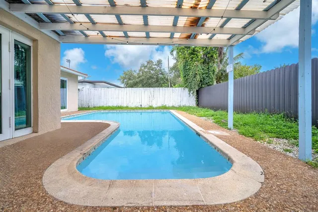 a view of a backyard with plants