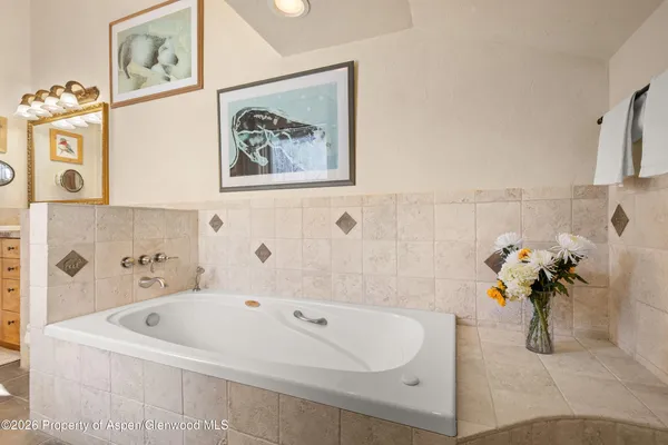 a view of a tree with a yard