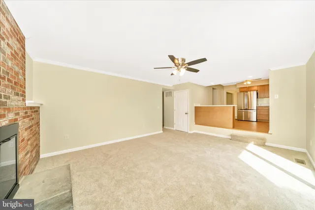 a view of an empty room and window