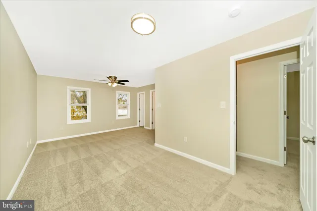 a view of a room that has a window in it