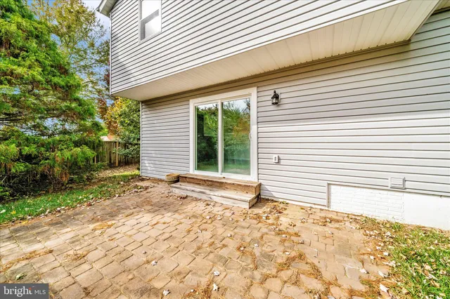 a view of a house with a yard and garage