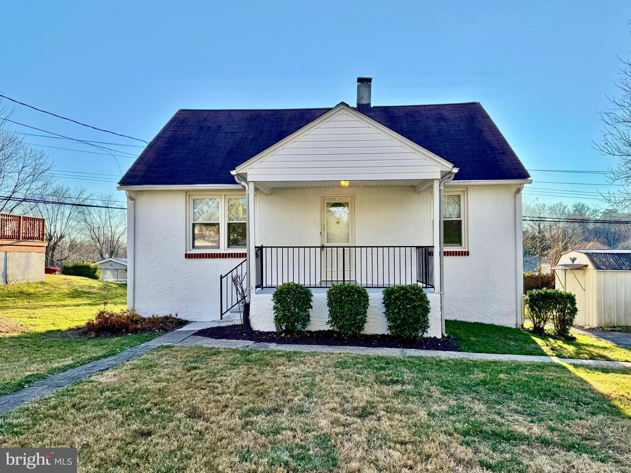2909 Duncan Lane Parkville, MD 21234 - Photo 1 of 20 a front view of a house with garden
