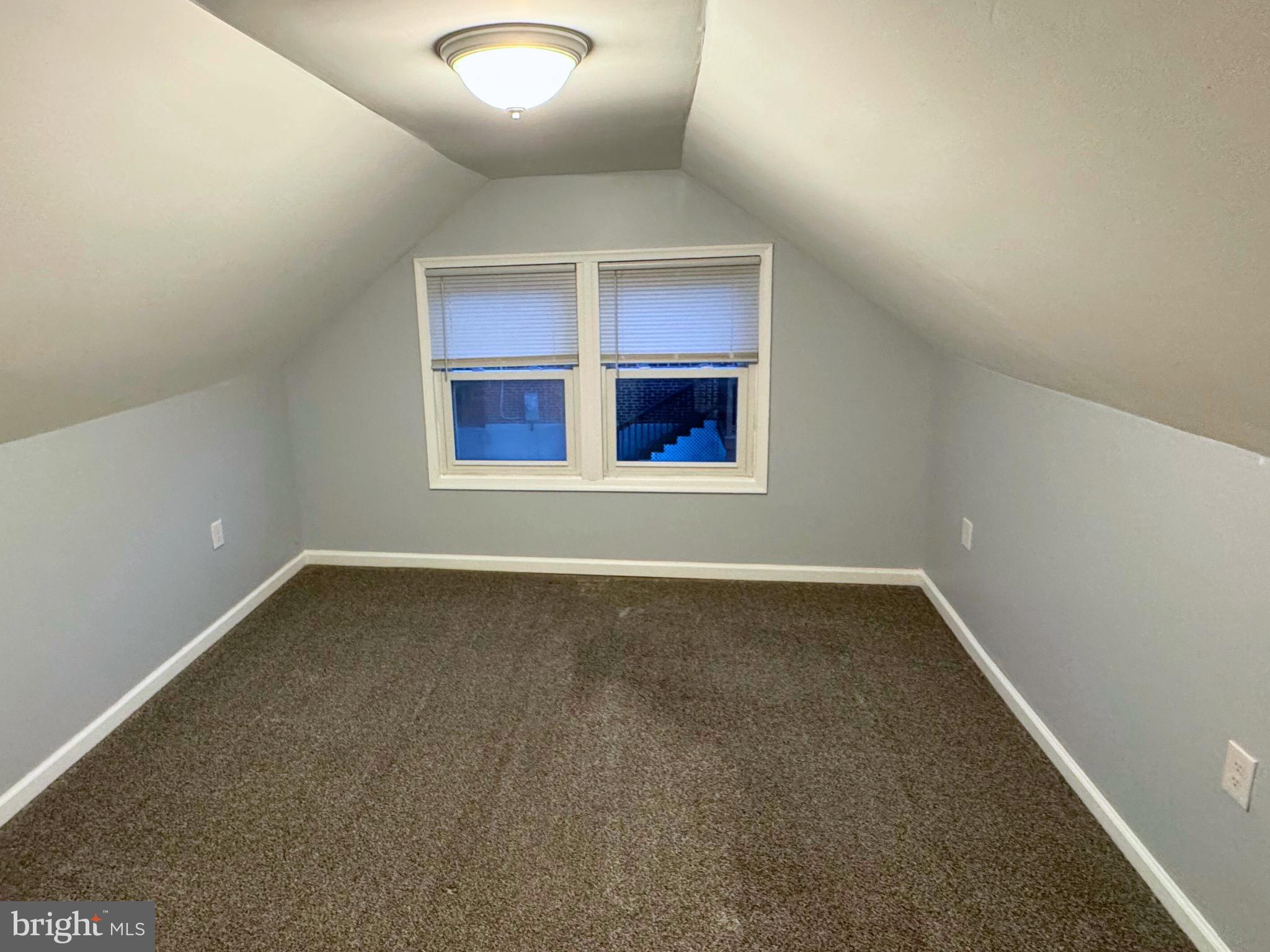 2909 Duncan Lane Parkville, MD 21234 - Photo 12 of 20 an empty room with a empty space and windows