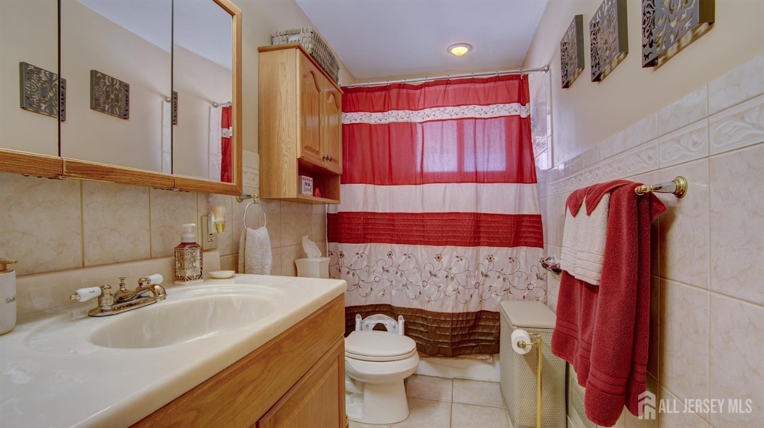 159 Newbury Road Howell, NJ 07731 - Photo 13 of 28 a bathroom with a sink toilet and shower