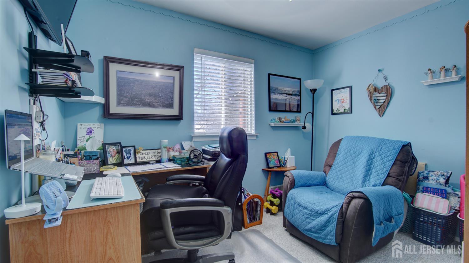 159 Newbury Road Howell, NJ 07731 - Photo 17 of 28 a living room with furniture a couch and a flat screen tv