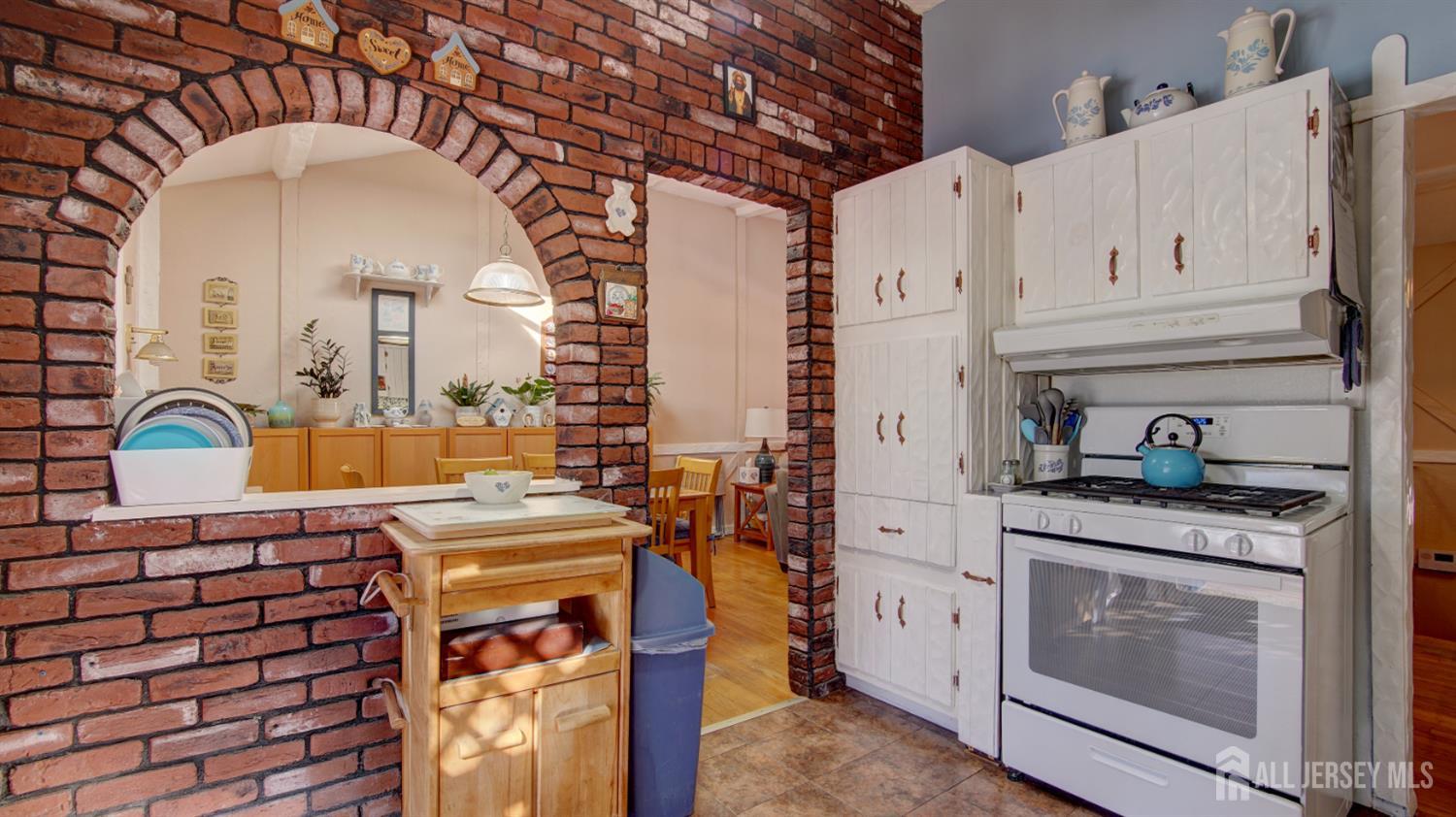 159 Newbury Road Howell, NJ 07731 - Photo 10 of 28 a kitchen with stainless steel appliances granite countertop a stove and a sink