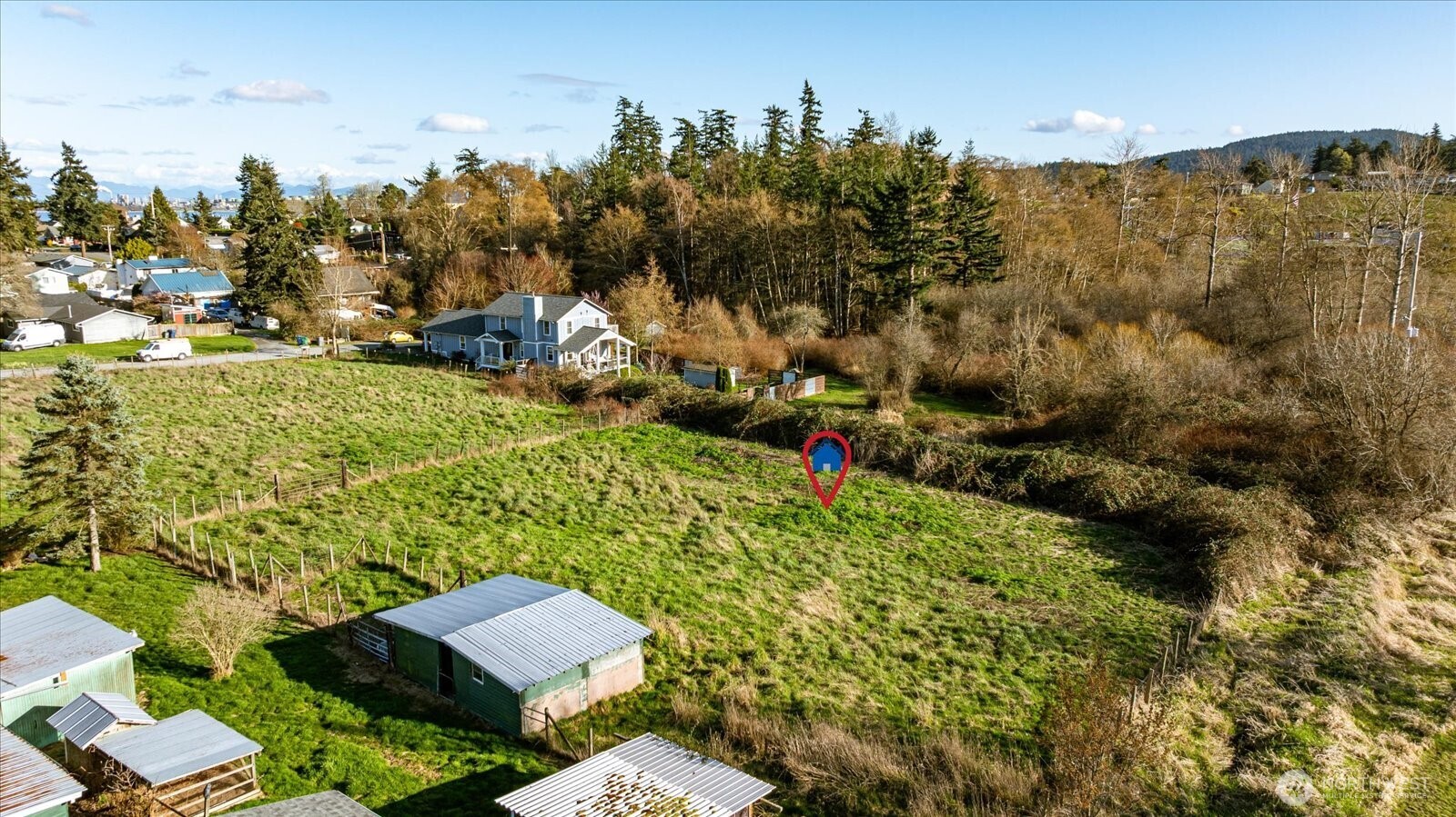 0 I Avenue Anacortes, WA 98221 - Photo 16 of 19 a view of a house with a yard and sitting area