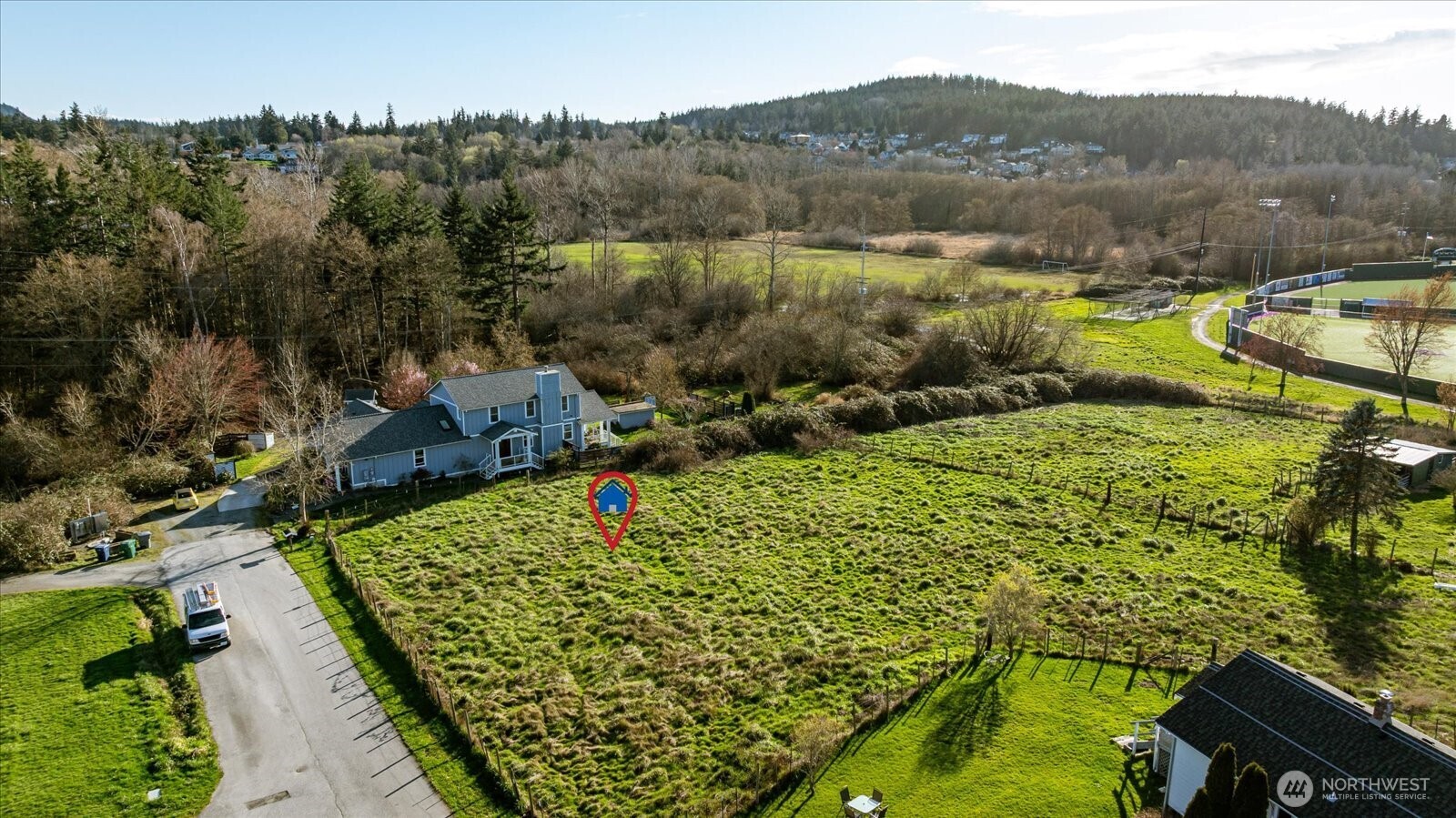 0 I Avenue Anacortes, WA 98221 - Photo 7 of 19 an aerial view of a house with a garden