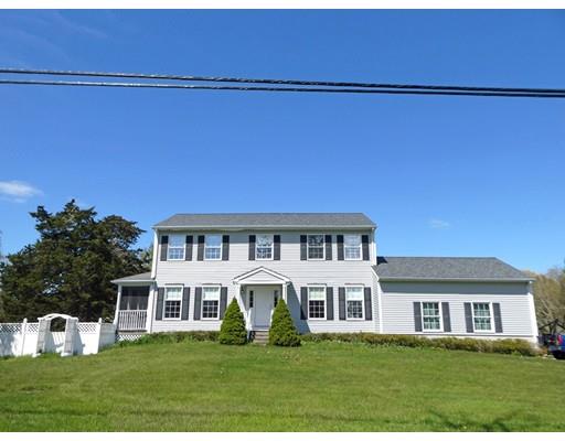 261 Cushman Road Rochester, MA 02770 - Photo 1 of 25 a front view of a house with a garden