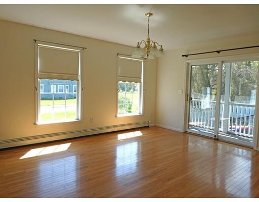 261 Cushman Road Rochester, MA 02770 - Photo 14 of 25 a view of an empty room with wooden floor and a window