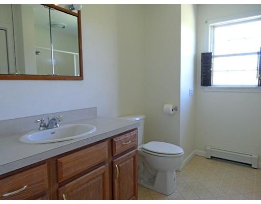261 Cushman Road Rochester, MA 02770 - Photo 22 of 25 a bathroom with a granite countertop sink toilet and a mirror