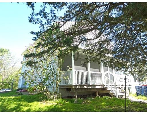 261 Cushman Road Rochester, MA 02770 - Photo 5 of 25 a view of backyard with deck and trees