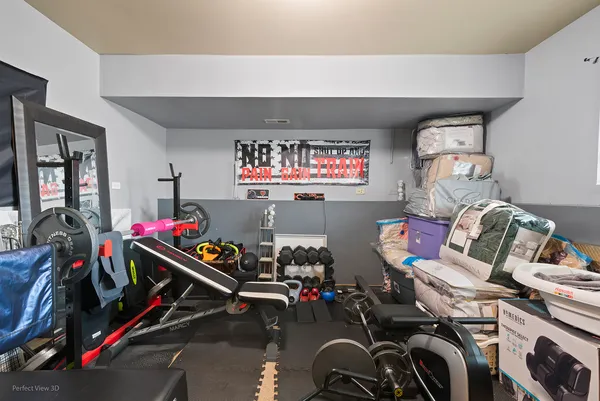 a room with gym equipment and equipment