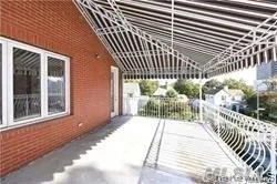 a view of a balcony with a potted plant