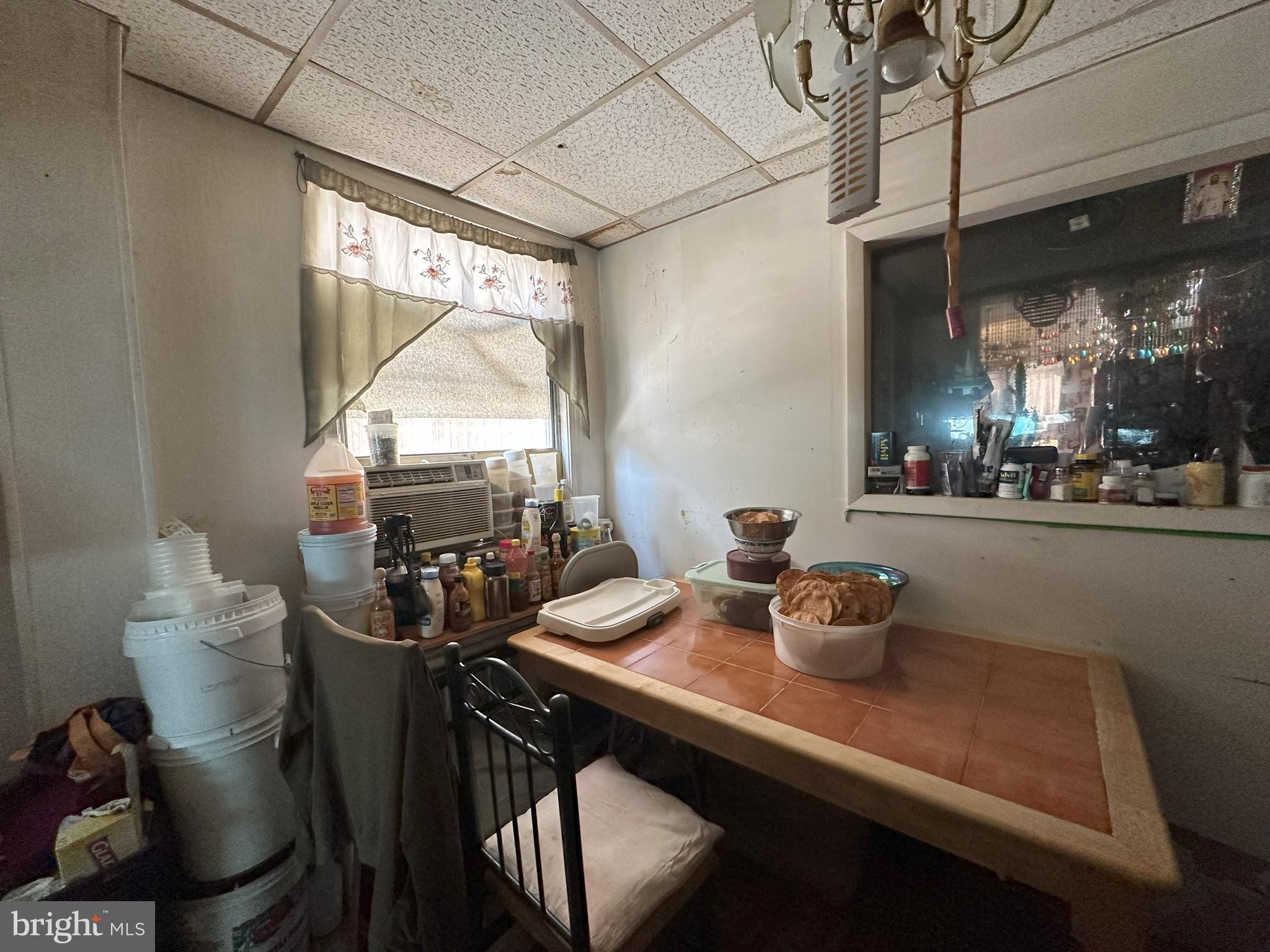 712 Moore Street Philadelphia, PA 19148 - Photo 7 of 11 a room with furniture and window