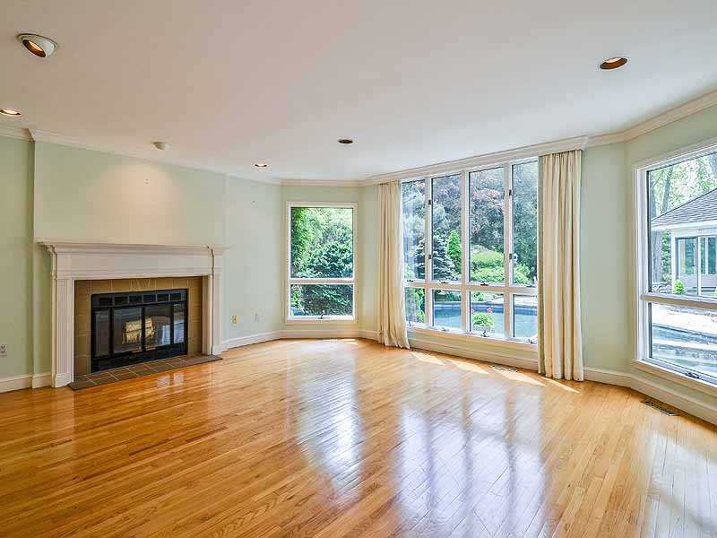 31 Point Road Norwalk, CT 06854 - Photo 5 of 19 a view of an empty room with wooden floor and a window