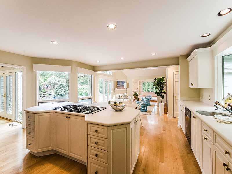 31 Point Road Norwalk, CT 06854 - Photo 6 of 19 a kitchen with sink stove and cabinets
