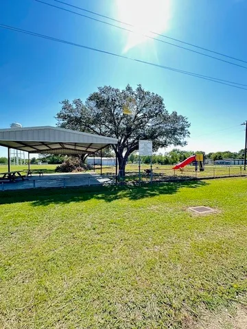 a view of yard with outdoor seating
