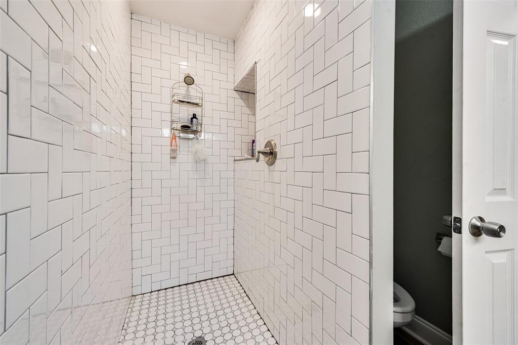 2522 Millmar Drive Dallas, TX 75228 - Photo 20 of 27 a bathroom with a shower