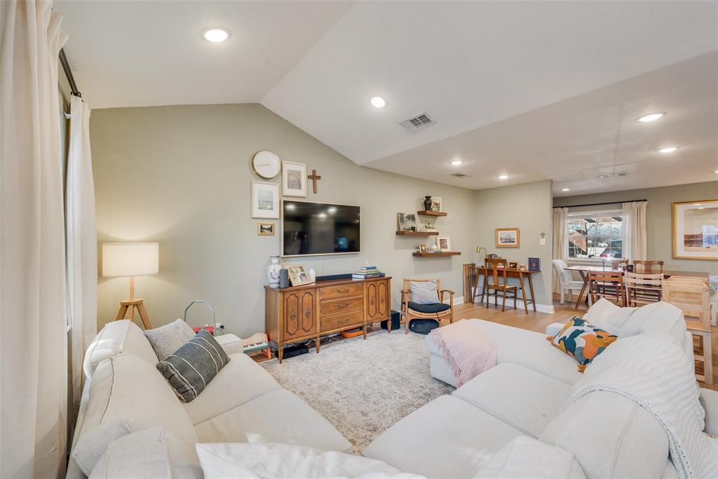 2522 Millmar Drive Dallas, TX 75228 - Photo 7 of 27 a living room with furniture and a flat screen tv