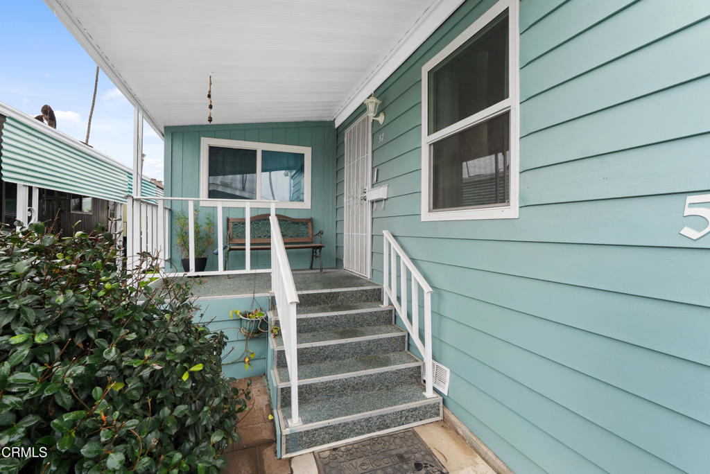 265 Beckwith Road, Unit 57 Santa Paula, CA 93060 - Photo 4 of 22 a view of wooden house with a window and stairs