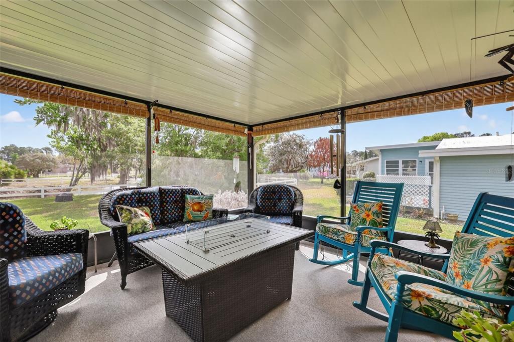 469 Santa Fe Road Tavares, FL 32778 - Photo 11 of 37 a view of a patio with swimming pool