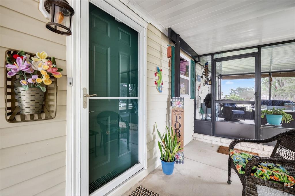 469 Santa Fe Road Tavares, FL 32778 - Photo 2 of 37 a view of a porch with furniture