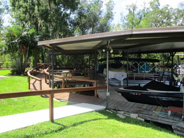 469 Santa Fe Road Tavares, FL 32778 - Photo 33 of 37 a view of outdoor space yard deck and patio