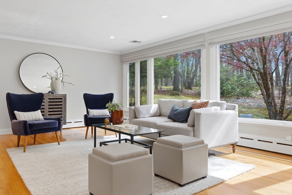 31 Huckleberry Hill Road Lincoln, MA 01773 - Photo 12 of 27 a living room with furniture and a large window