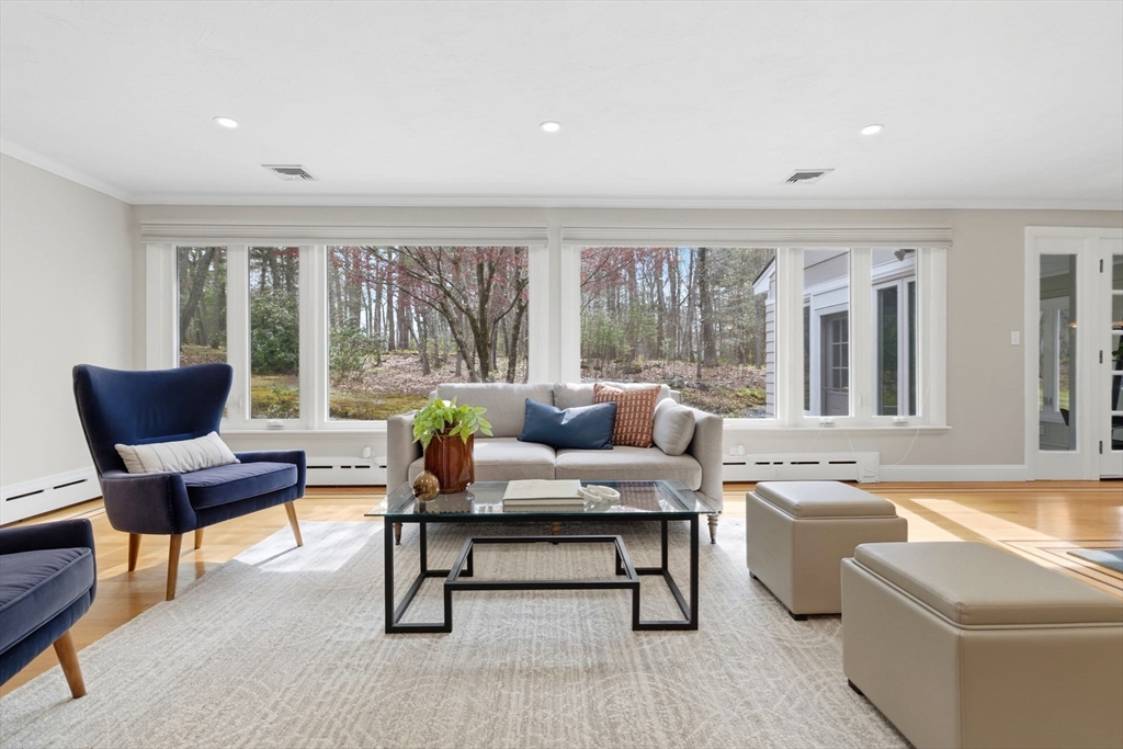31 Huckleberry Hill Road Lincoln, MA 01773 - Photo 2 of 27 a living room with furniture and a large window