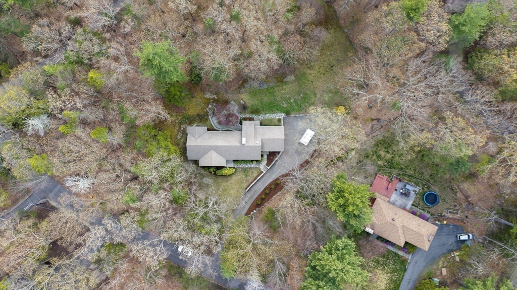 31 Huckleberry Hill Road Lincoln, MA 01773 - Photo 27 of 27 an aerial view of a house with outdoor space