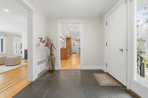 a bathroom with a tub shower and sink