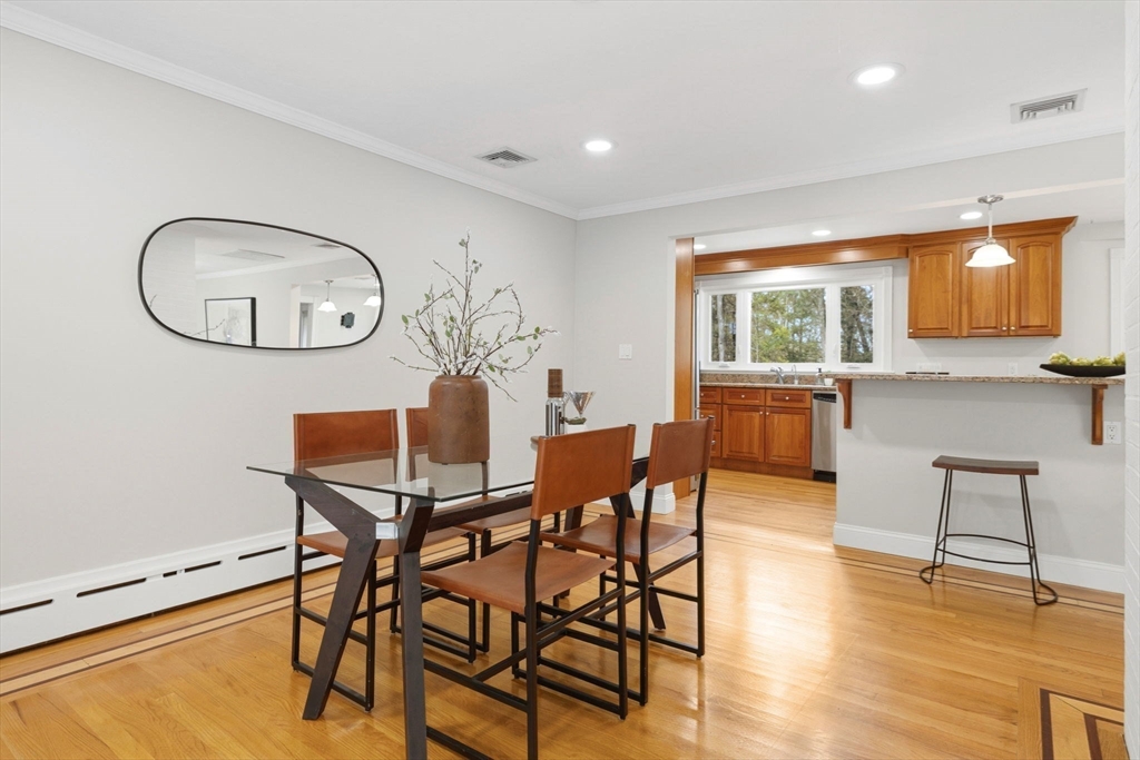 31 Huckleberry Hill Road Lincoln, MA 01773 - Photo 7 of 27 a view of a dining room with furniture and wooden floor