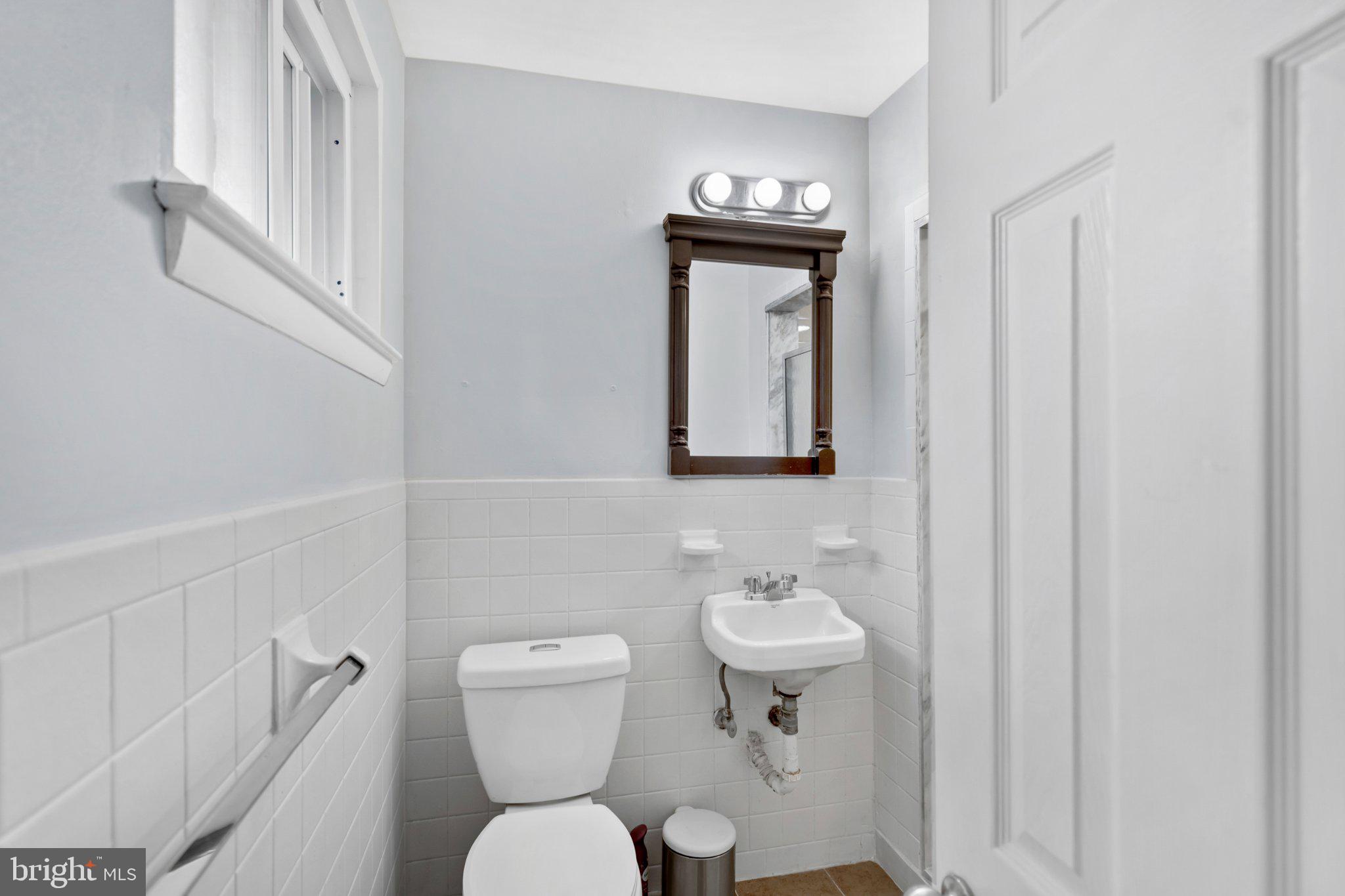 609 Foster Road Cheltenham, PA 19012 - Photo 37 of 44 Charming bathroom with modern touches.