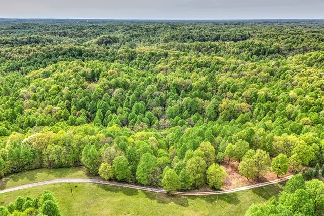 a view of a field with an outdoor space