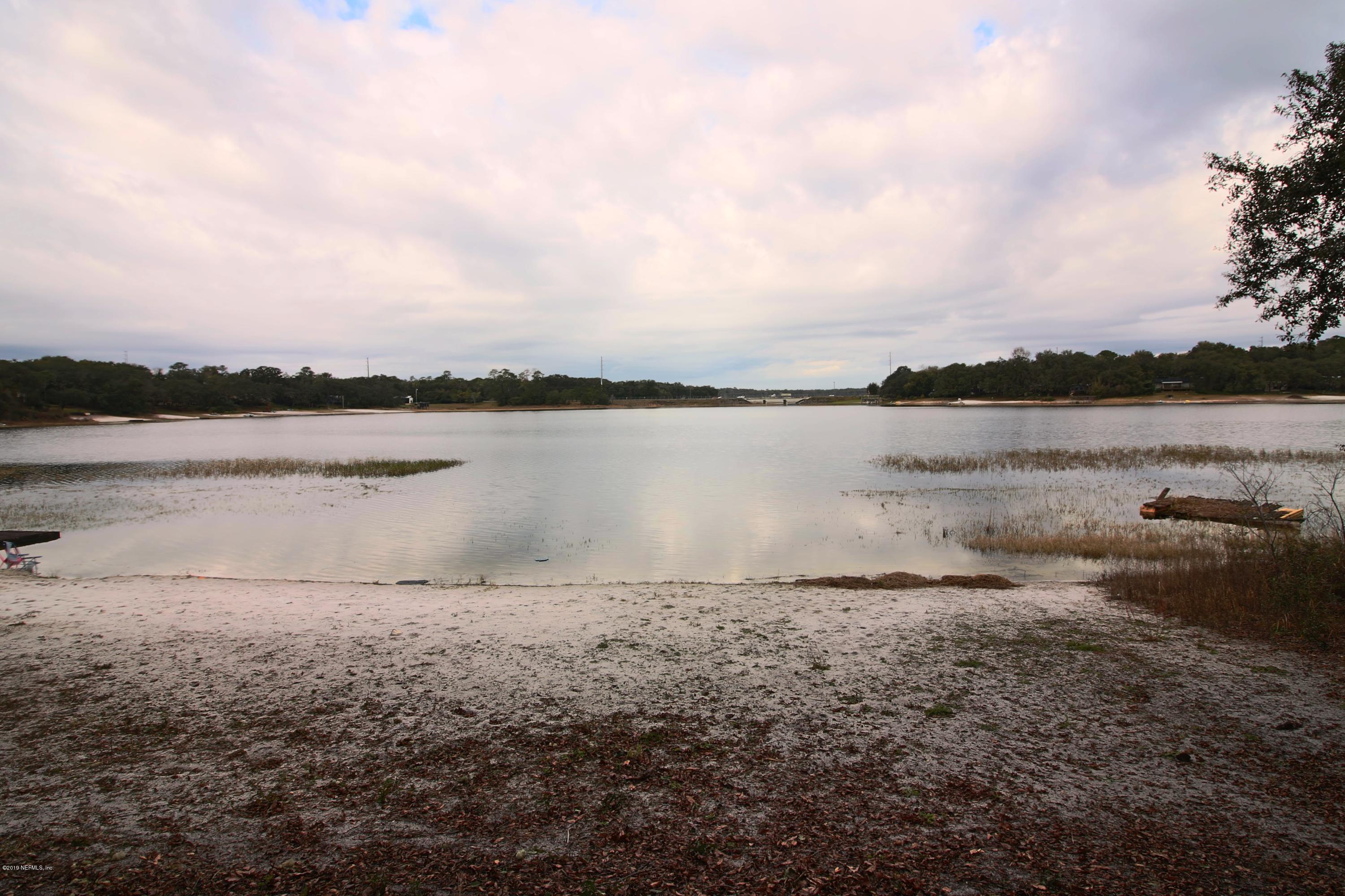 6606 Brooklyn Bay Road Keystone Heights, FL 32656 - Photo 46 of 62 a view of a lake with a lake