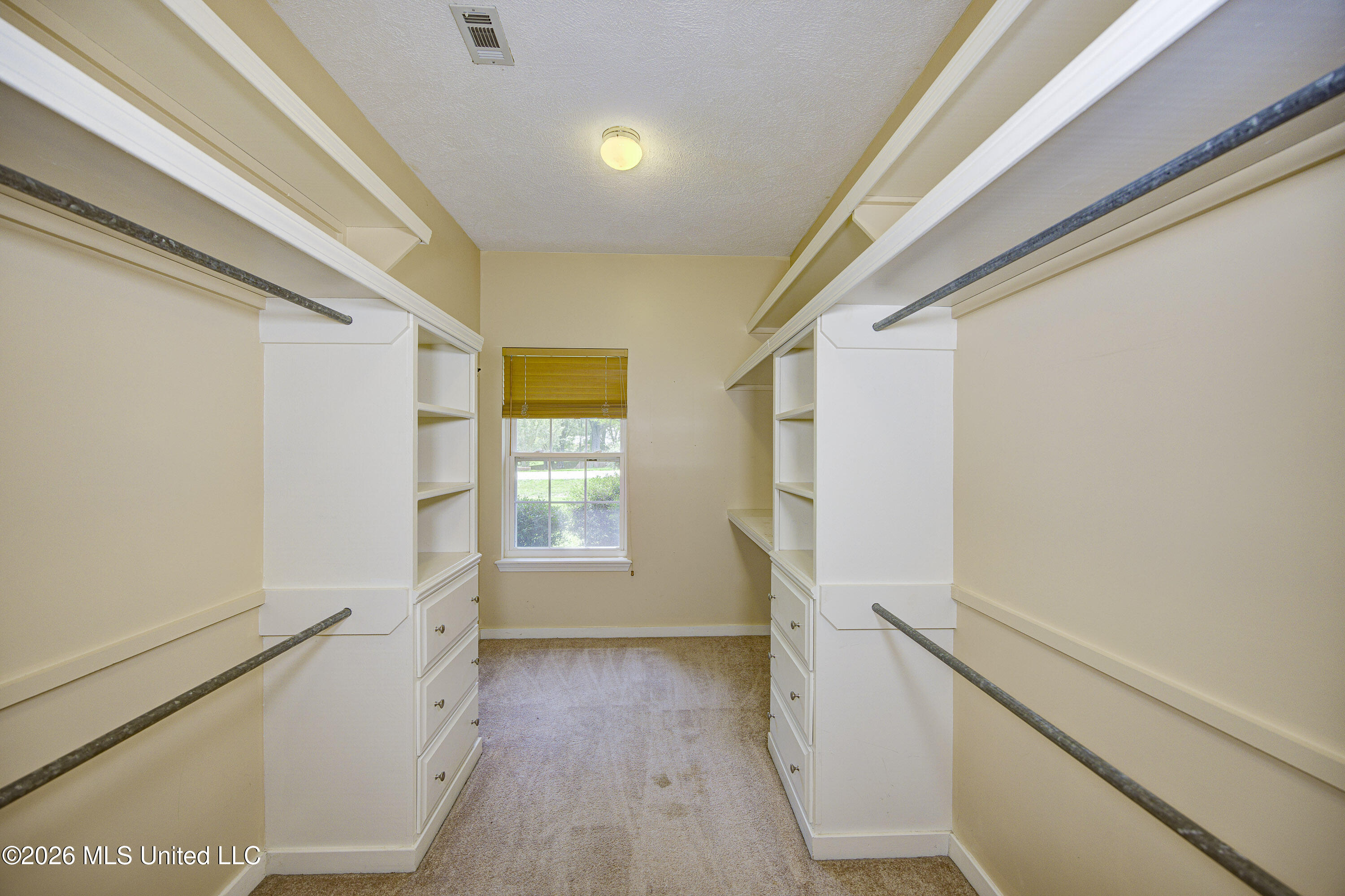 6003 Queens Point Vicksburg, MS 39180 - Photo 23 of 47 Primary Bedroom Walk-In Closet