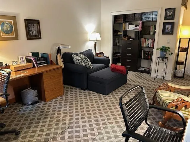 a room with cabinets and wooden floor