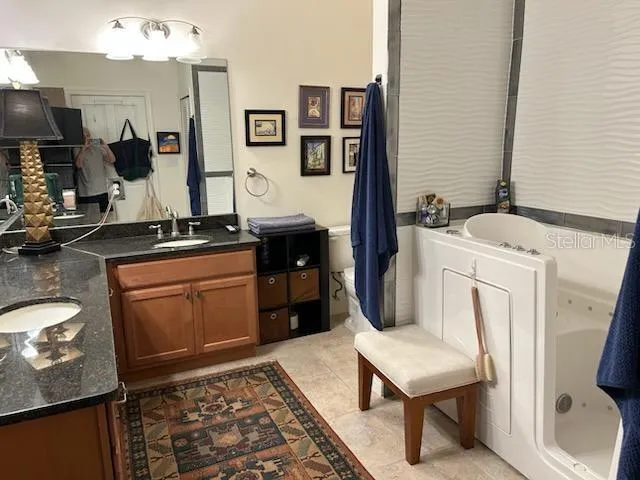 a kitchen with a sink and a stove