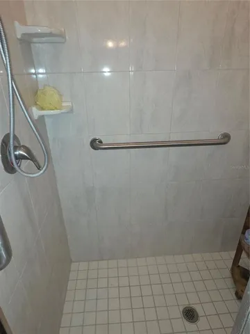 a view of balcony with wooden floor