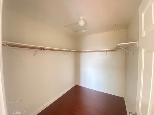 a bathroom with a sink toilet vanity and shower