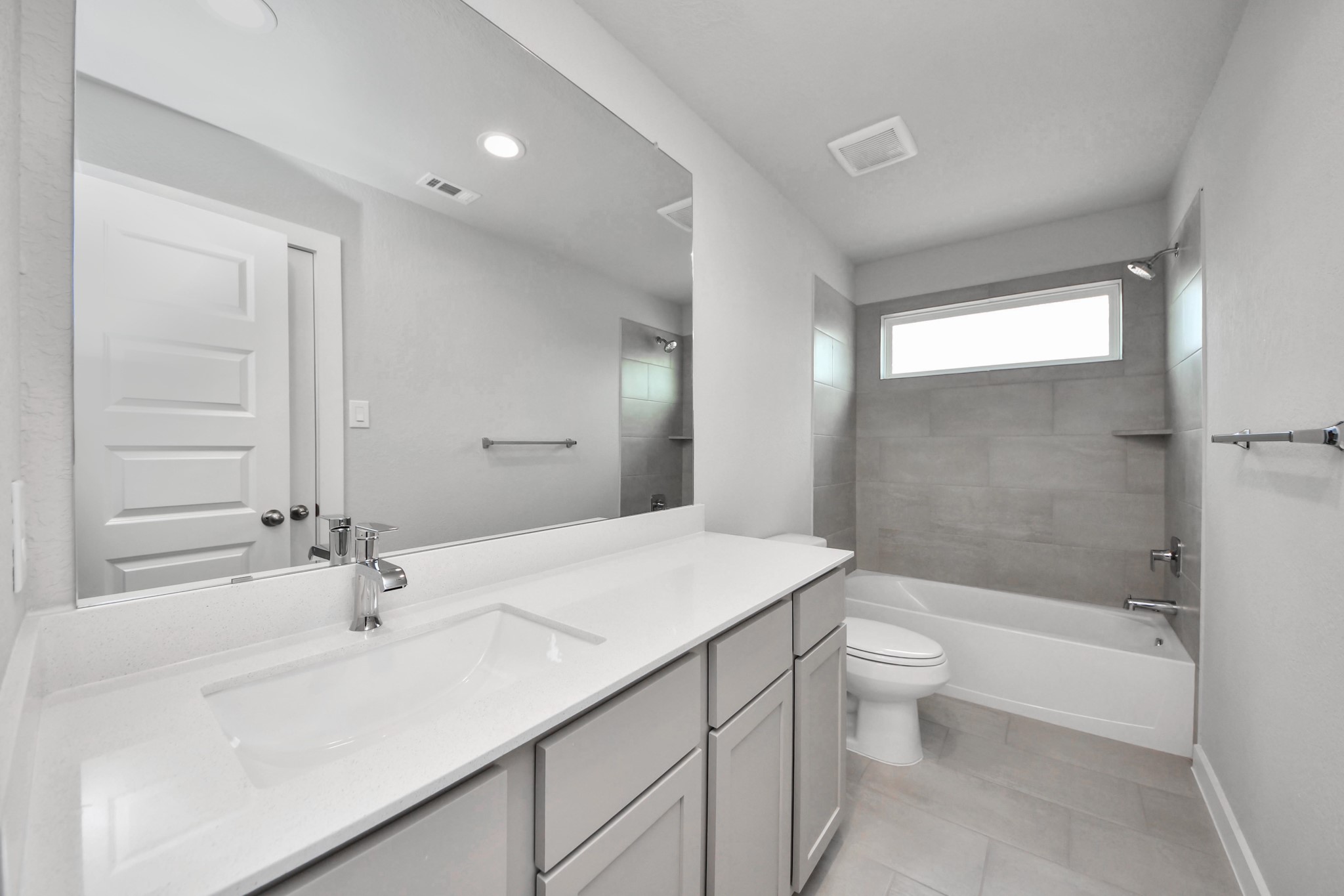 11122 Tulip Rdg Trail Houston, TX 77044 - Photo 28 of 34 a bathroom with a sink a toilet and shower