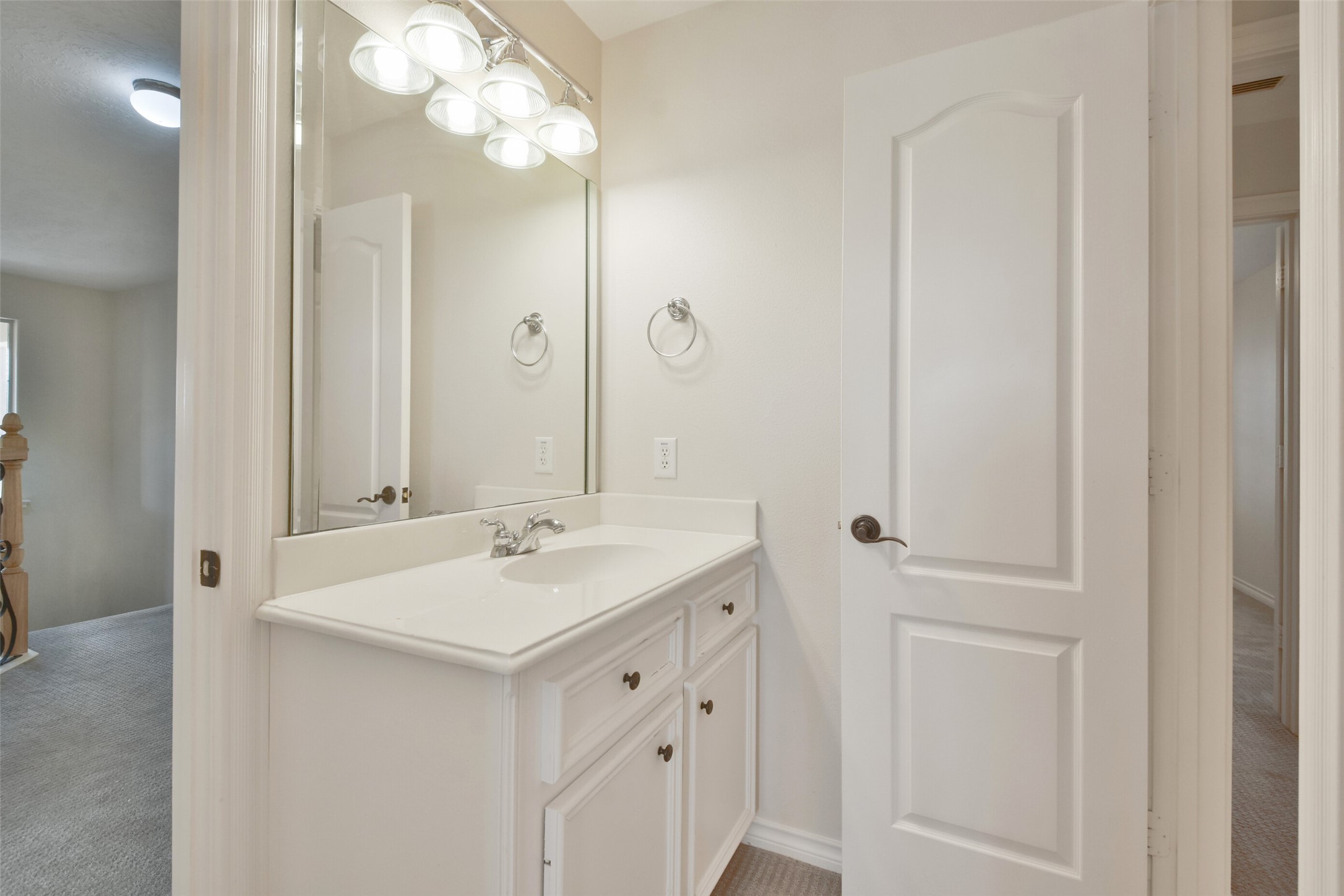 8114 Hideaway Lake Circle Spring, TX 77389 - Photo 32 of 50 a bathroom with a sink and a mirror