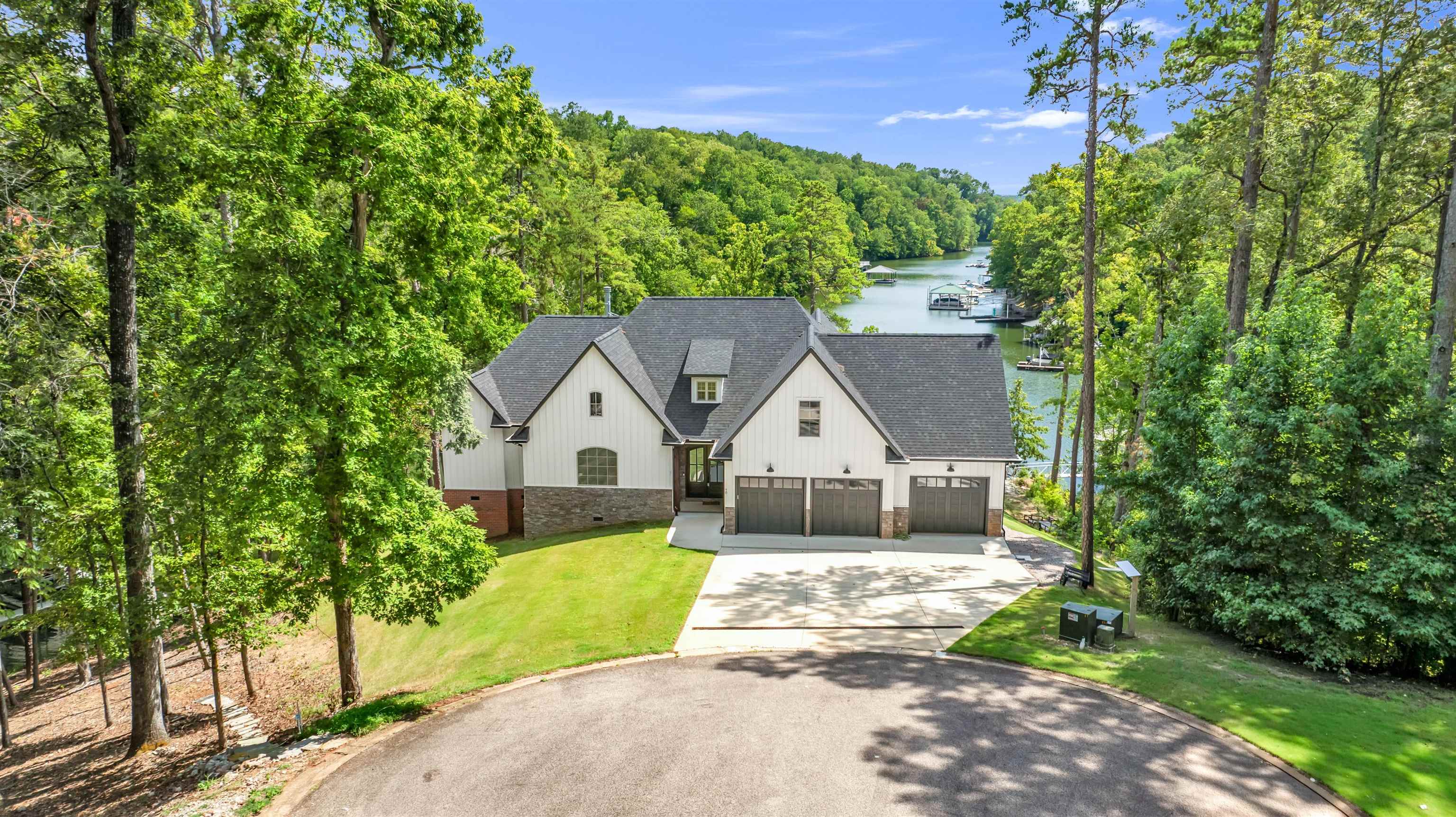 70 Native Leaf Cove Savannah, TN 38372 - Photo 2 of 40 a front view of a house with a yard and trees